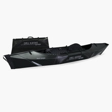 Side view of the Oru Kayak Inlet Sport model in black, shown fully assembled in front of its compact folded box form.