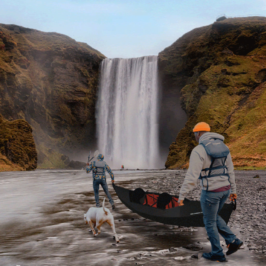 2 people carrying haven tt black edition