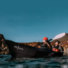 2 people and dog kayaking on a haven tt kayak black edition