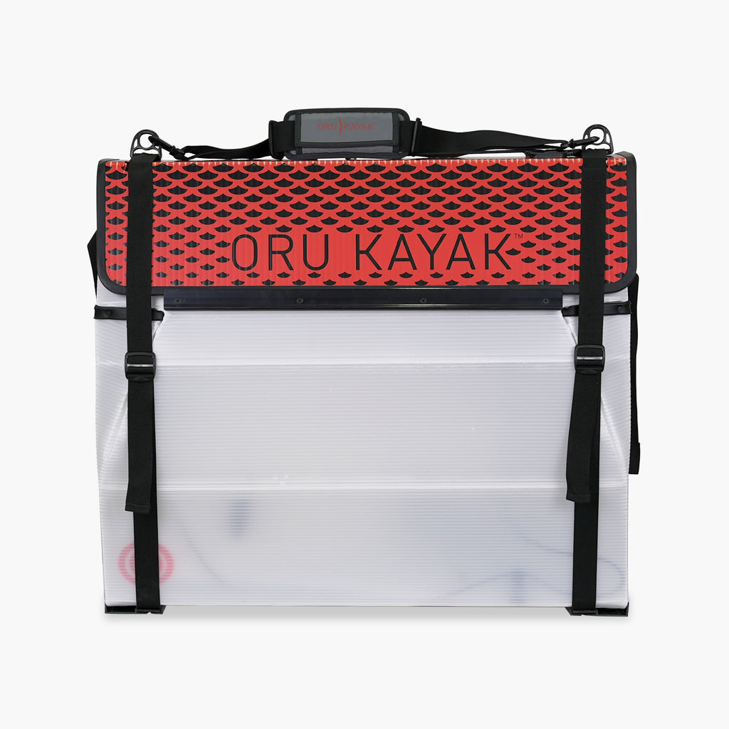 Folded white Oru Kayak Beach Sport model in white in box form.