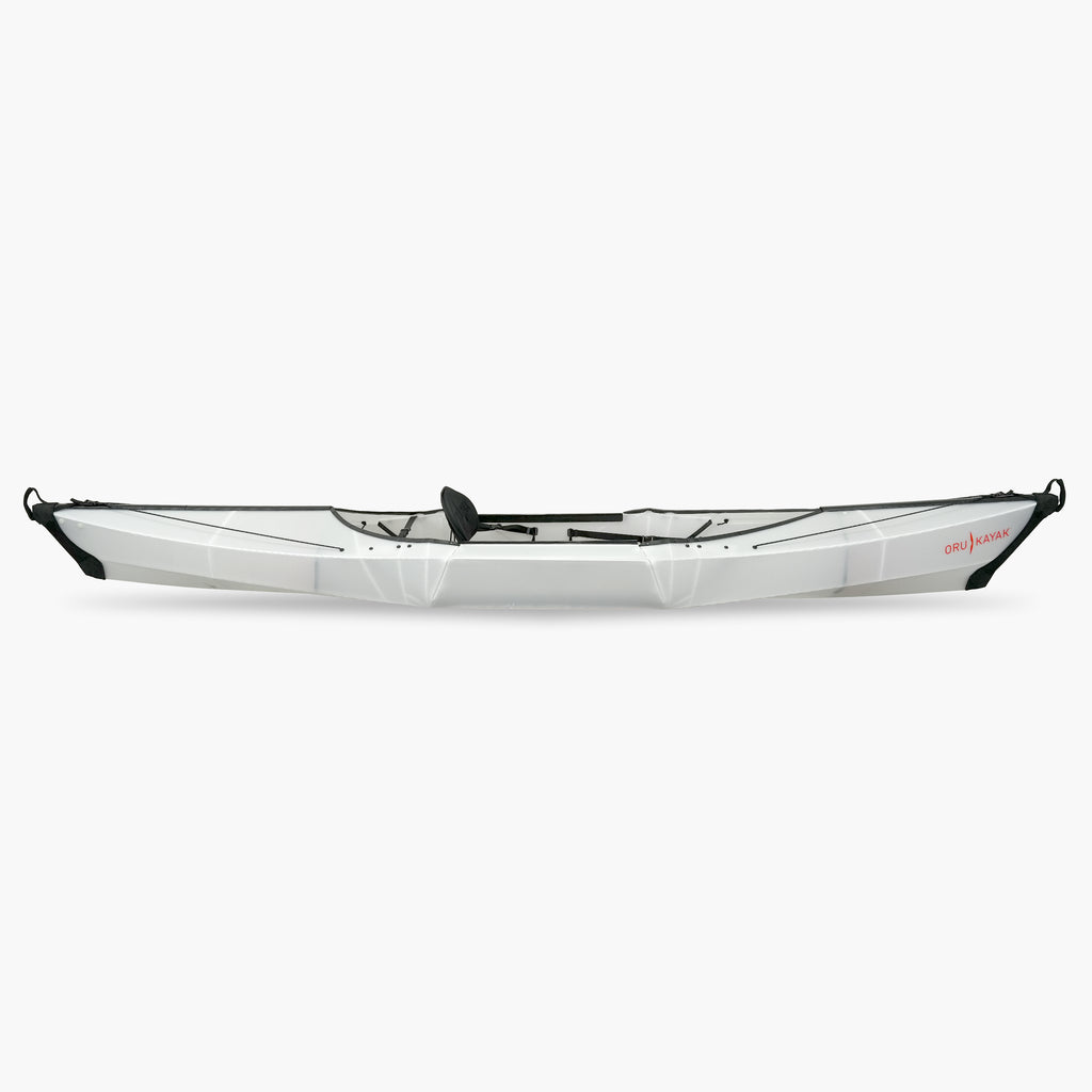 Side view of the Oru Kayak Beach Sport model in white.