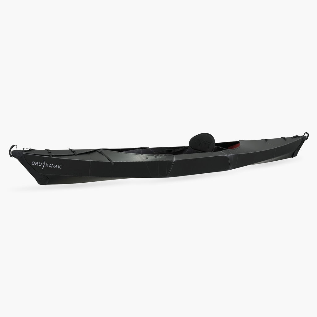 Side view of the Oru Kayak Beach model in black.