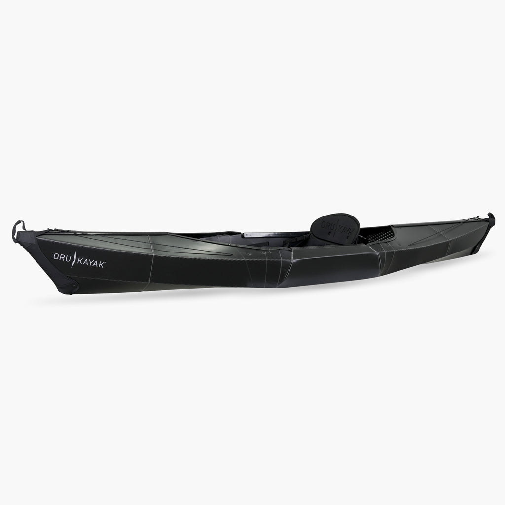 Side view of the Oru Kayak Beach Sport model in black.