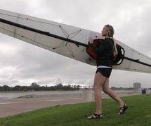 woman carrying coast xt unfolded